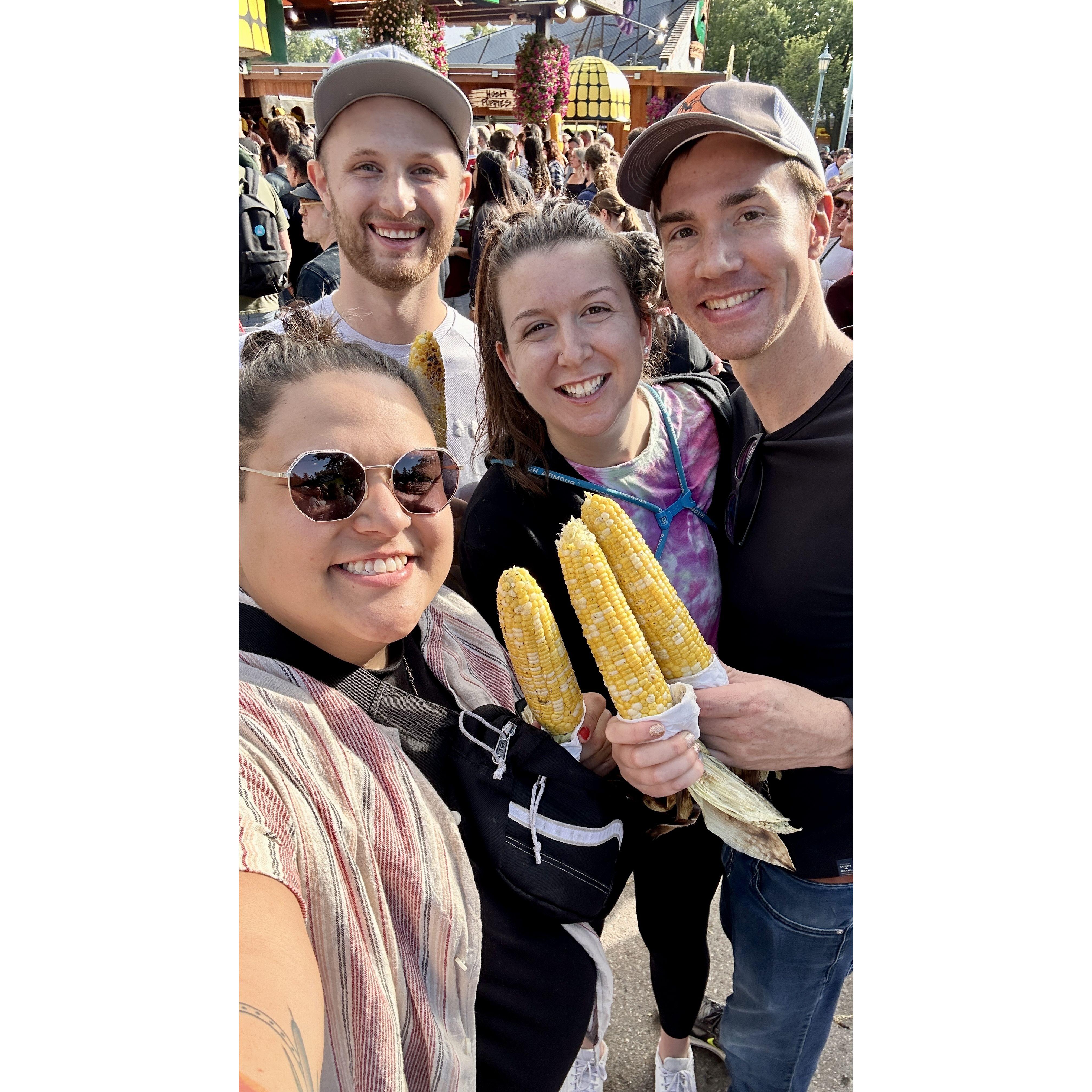 Enjoying corn with good friends.