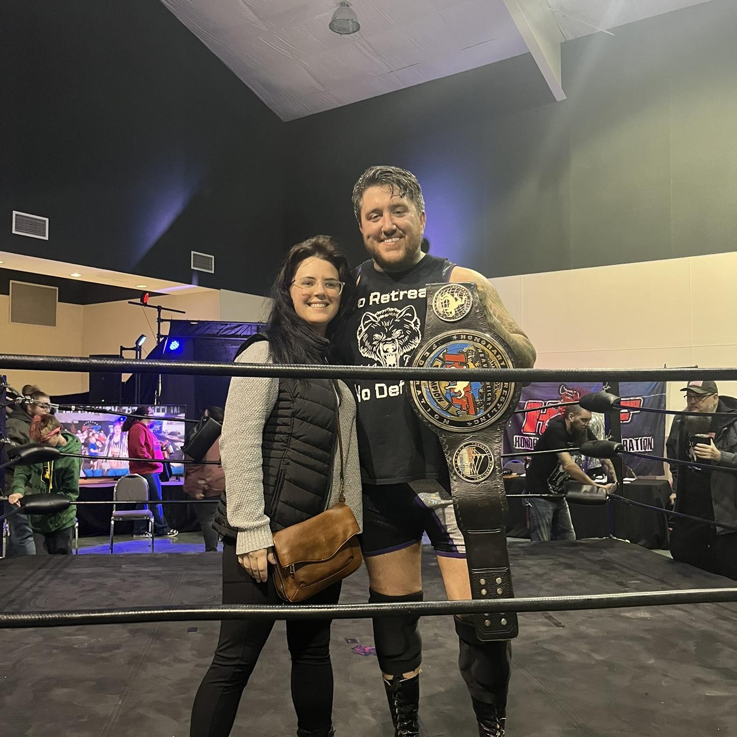 Zach winning the heavyweight championship belt!