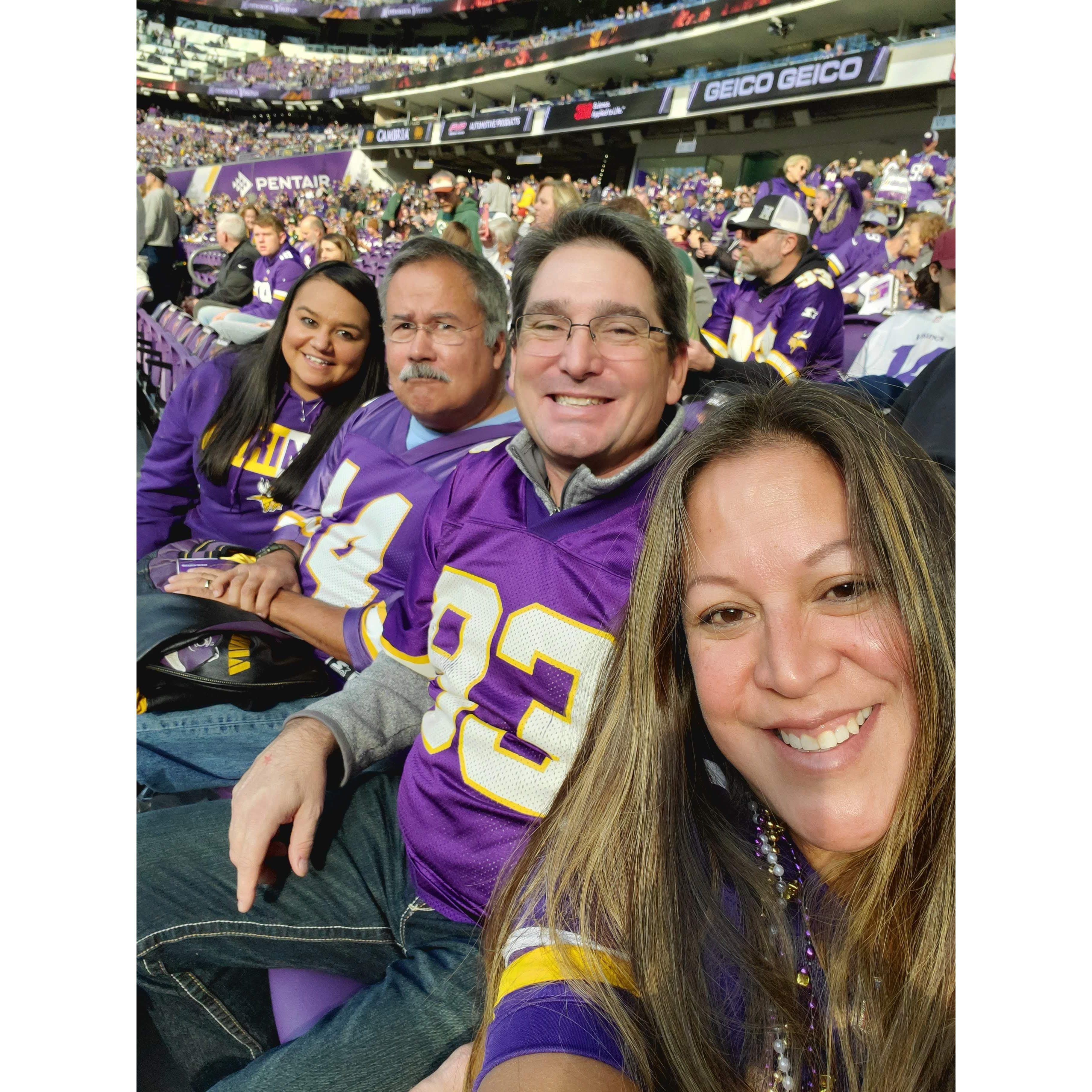 Burt playing a Vikings fan for Teresa's benefit