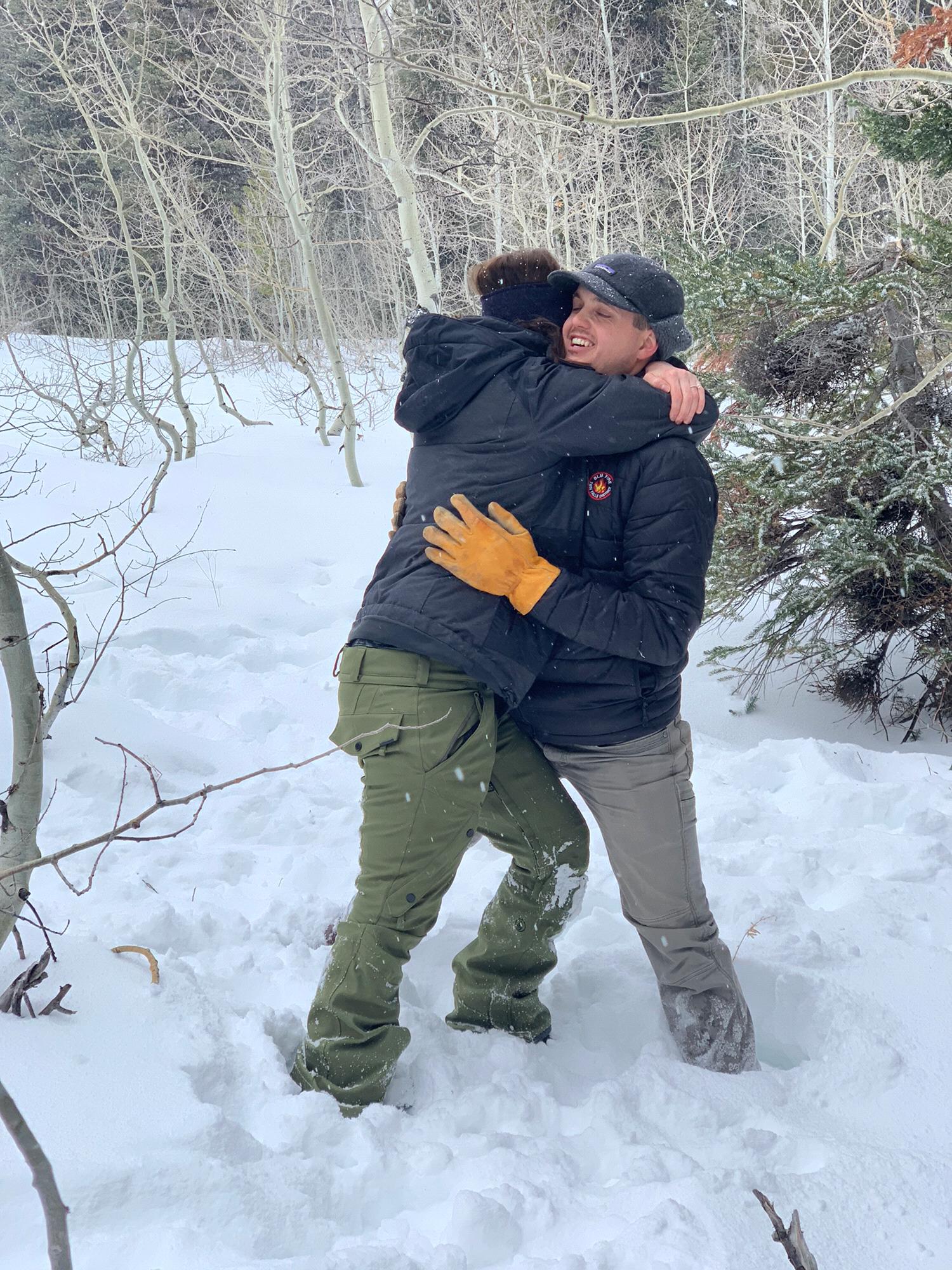 We were picking out our Christmas tree and when I was searching for the perfect one, I turned around to Rob and he was on one knee.