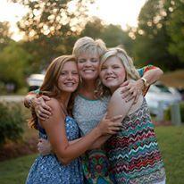 Caroline with her mom and sister