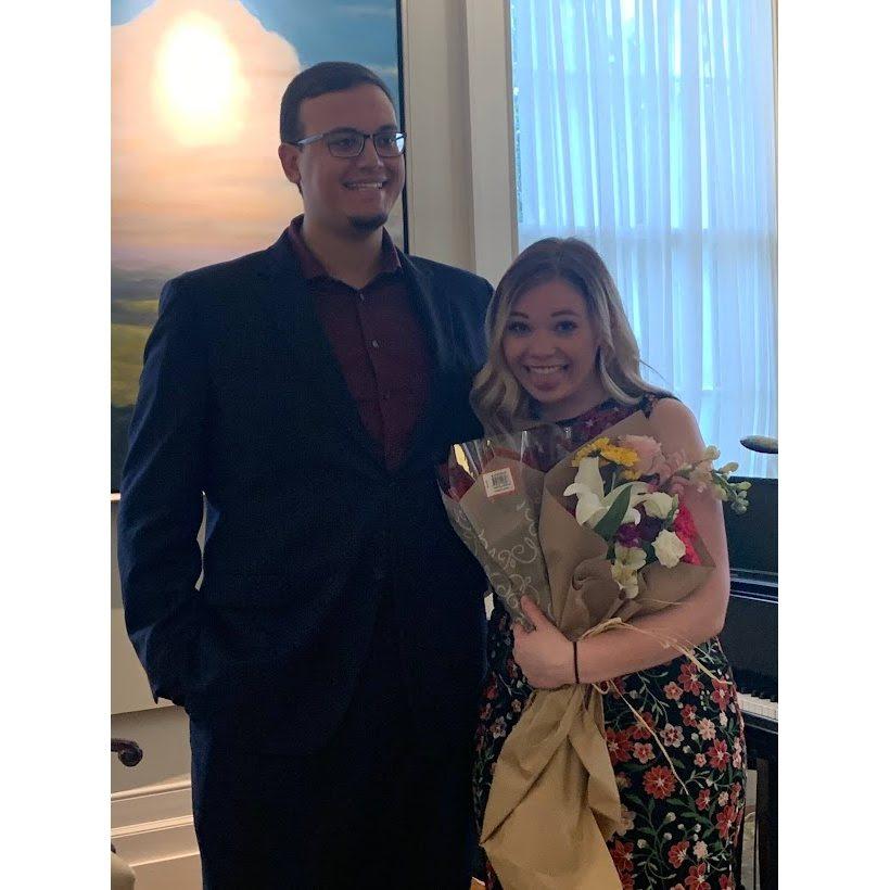 Derrick being the great man he is by bringing flowers to support Katherine at her Junior Recital