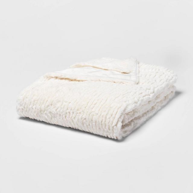 55" x 80" Cut Faux Fur Solid Bed Throw Cream - Threshold™
