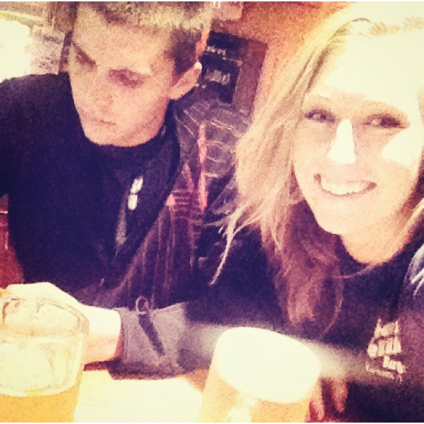 Having a drink at The Tap in Hayward Wisconsin in our matching Beer Bellies work shirts after closing the bar down together and taking a Razor to the bar. July 2014