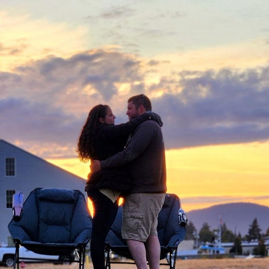 A random person gave us this sweet picture after a summer concert in Anacortes. We hadn't seen each other all week and were just having a sweet moment which she happened to capture.