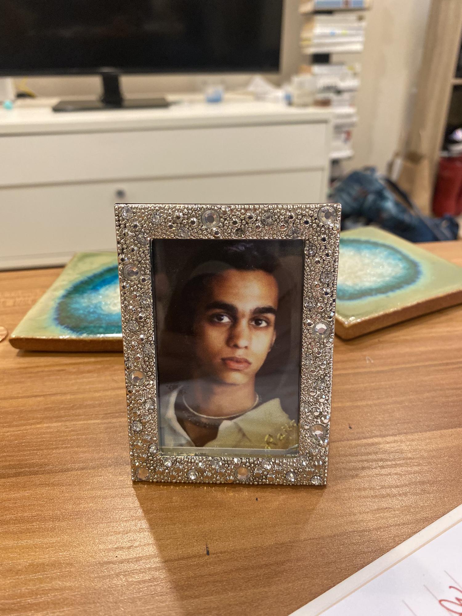 My first prank. Framed a high school photo and hid it in plain sight. He didn’t see it for 3 weeks