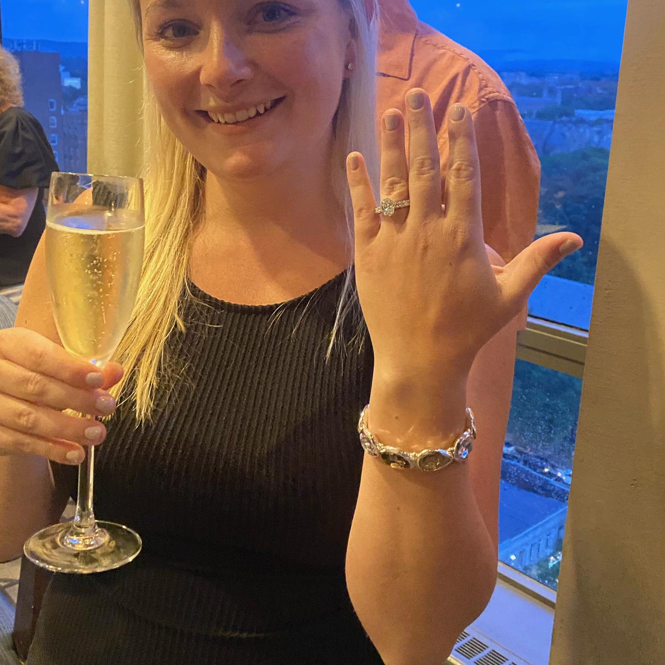 So on September 8, 2023, after 10 years, Elijah proposed at the top floor restaurant of the Omni Hotel surrounded by our families.