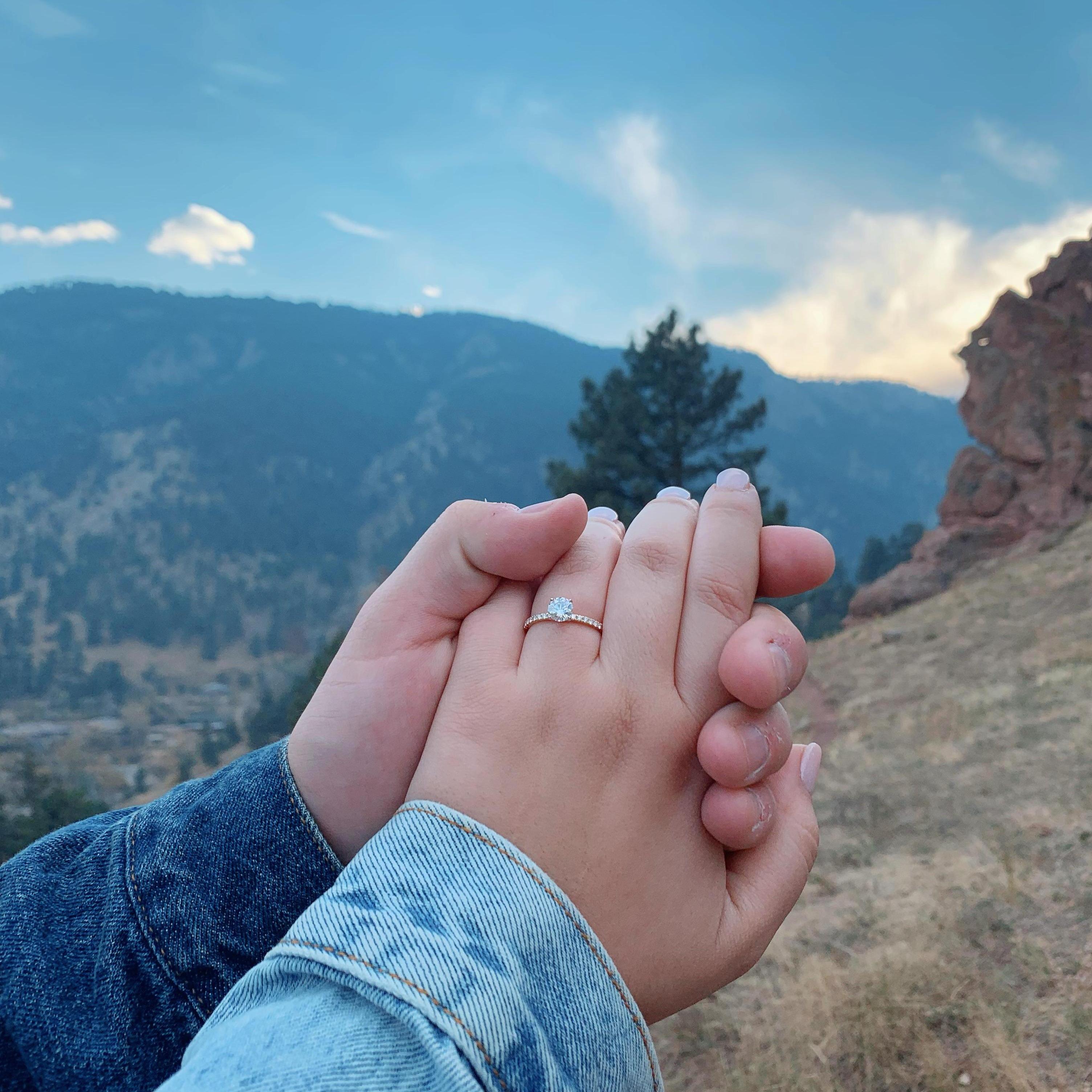 This photo was taken on our first hike as an engaged couple! (Denver, CO in October 2020)