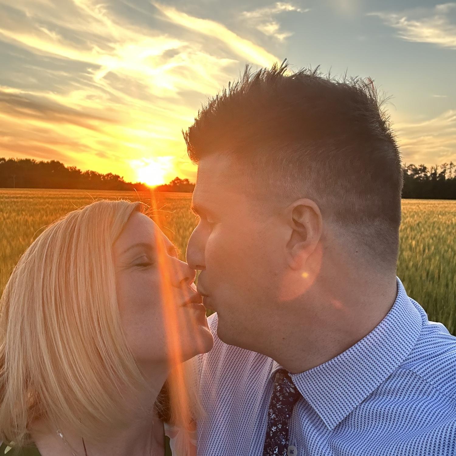 Stealing a sunset kiss while attending Katie's wedding in VA.