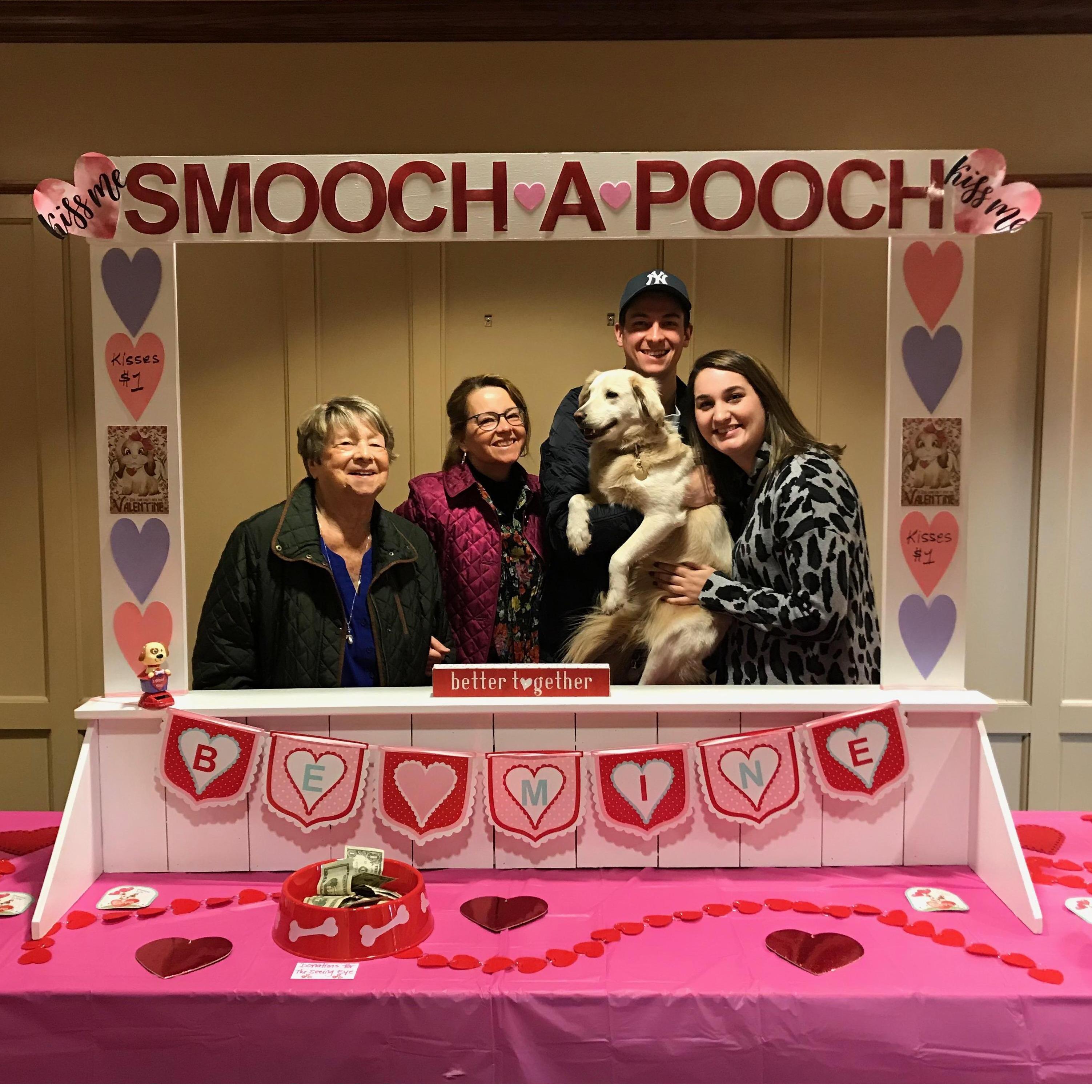 Grandma Carole, Cathy, Thomas, Amanda Mae, and Luna at the Smooch-A-Pooch booth at Parker Home!