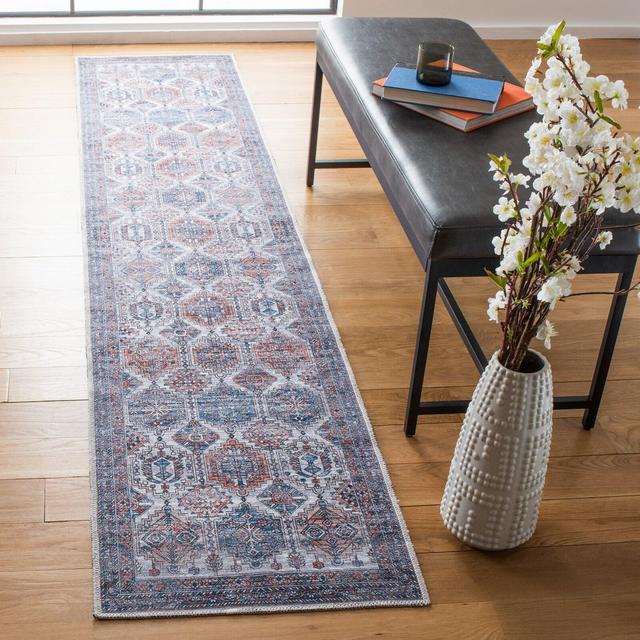 Alshawn Oriental Area Rug in Ivory / Rust