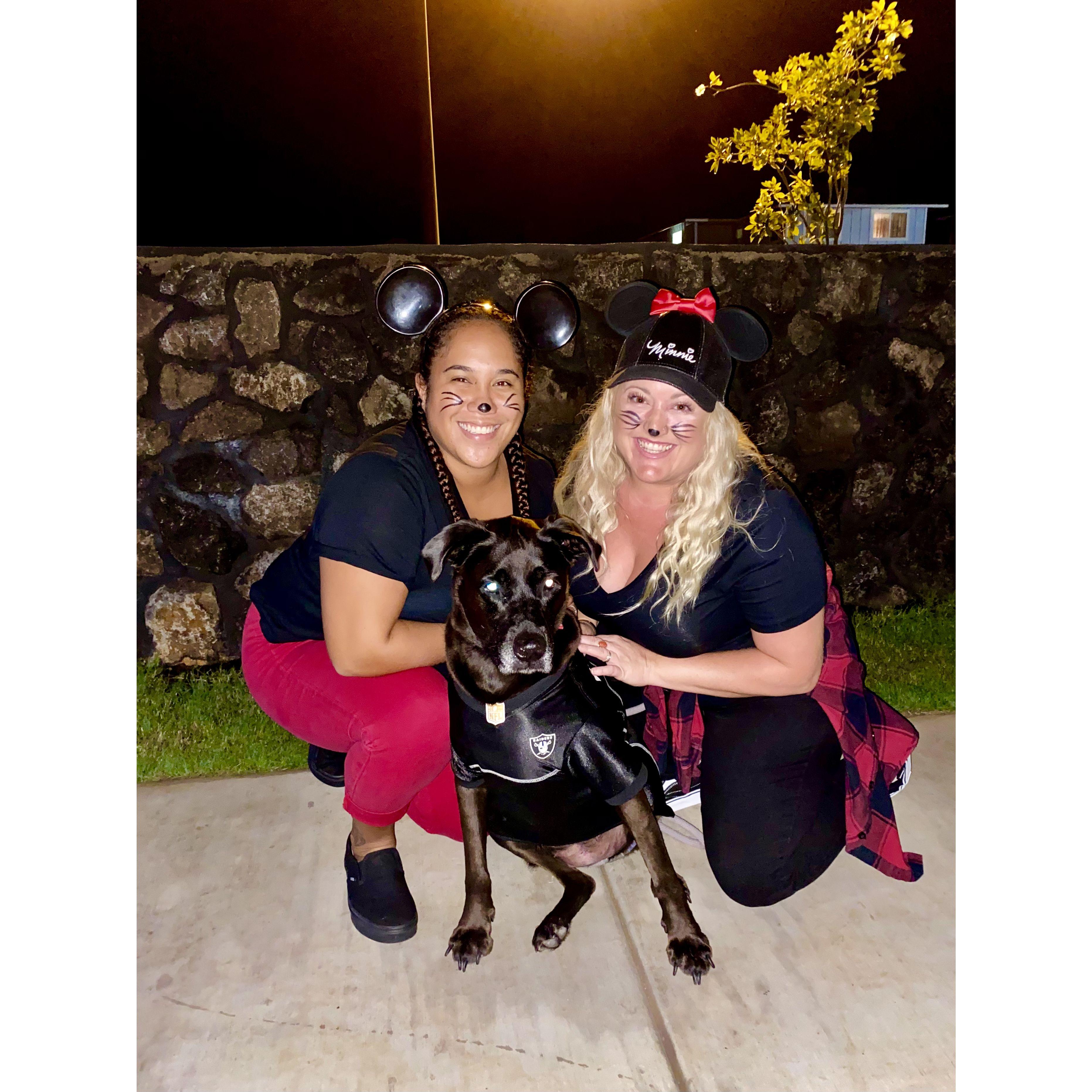Our first Halloween together as Mickey and Mini with our Raider Fan!