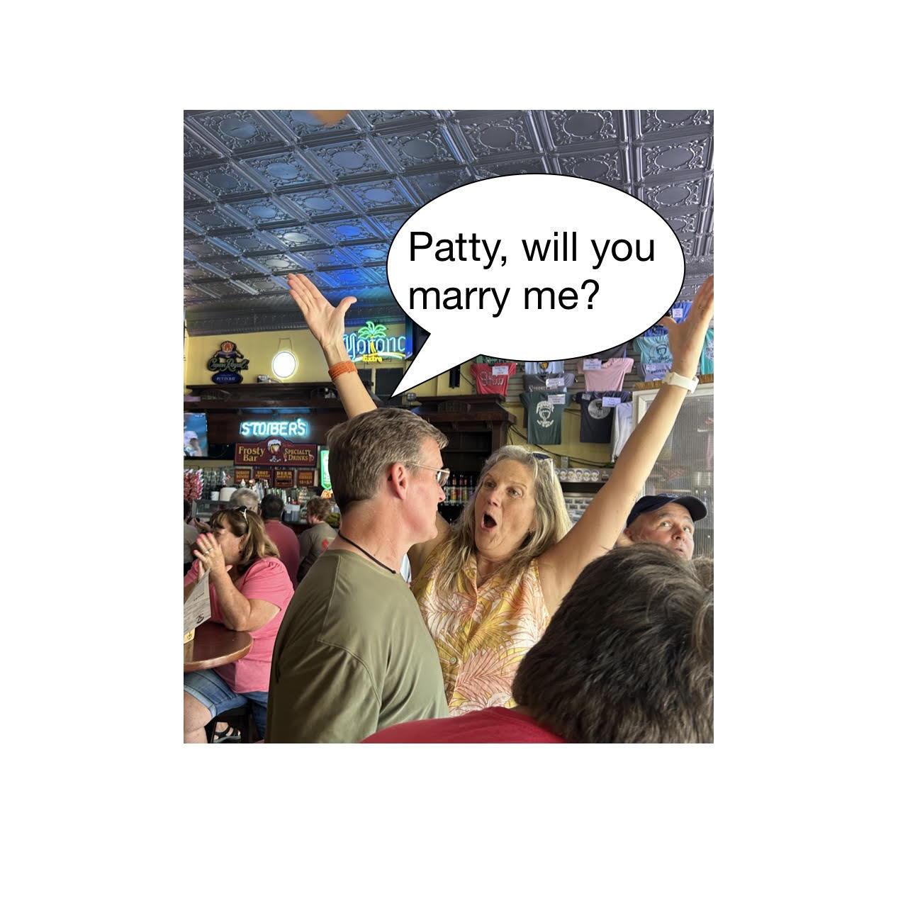I got to join Patty and her friends on their annual outing to Put-In-Bay. Here, I had some fun with a pic taken just after the Buckeyes scored. Her actual reaction when I proposed was underwhelming.