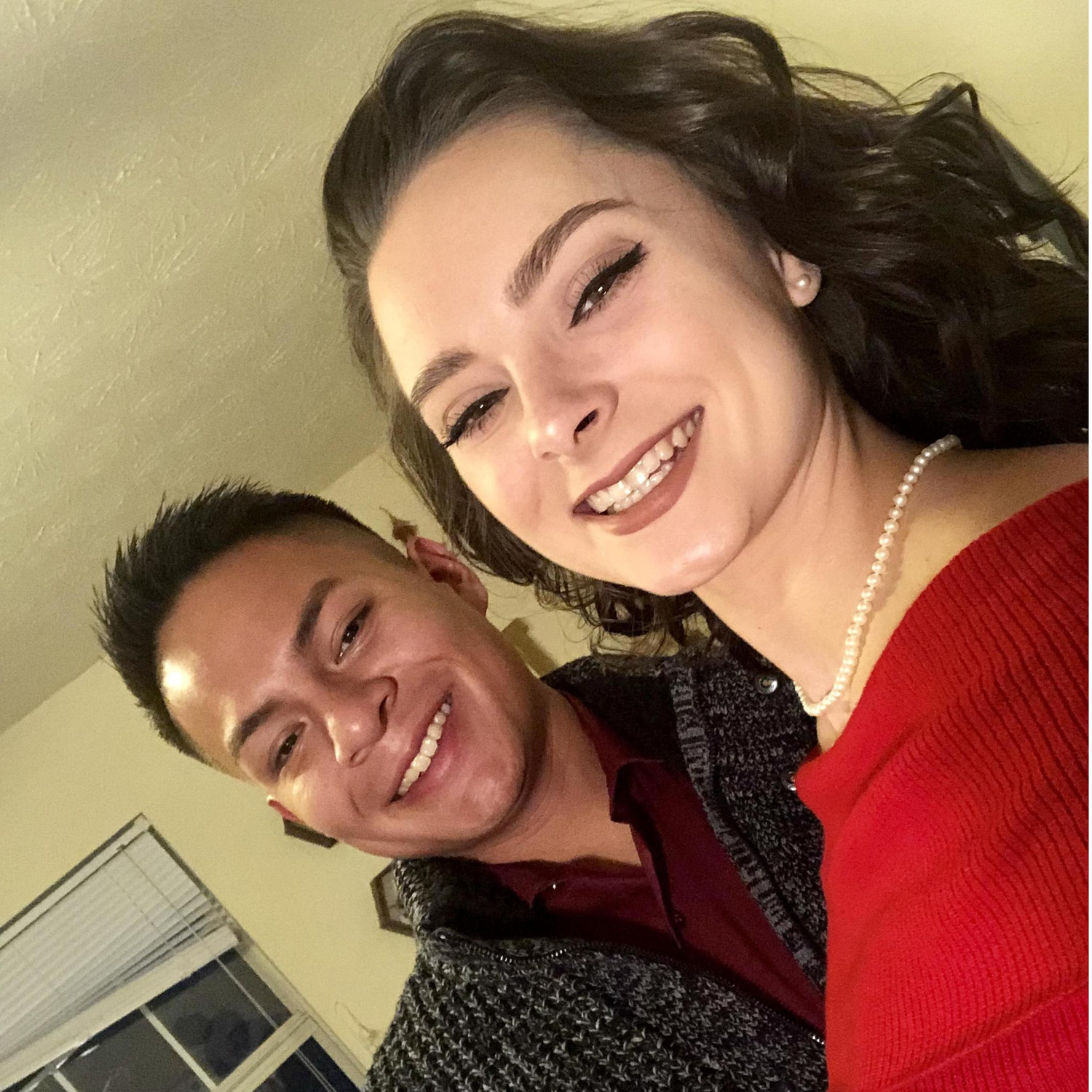 We took this selfie just before heading off to dinner the night Irivn proposed!