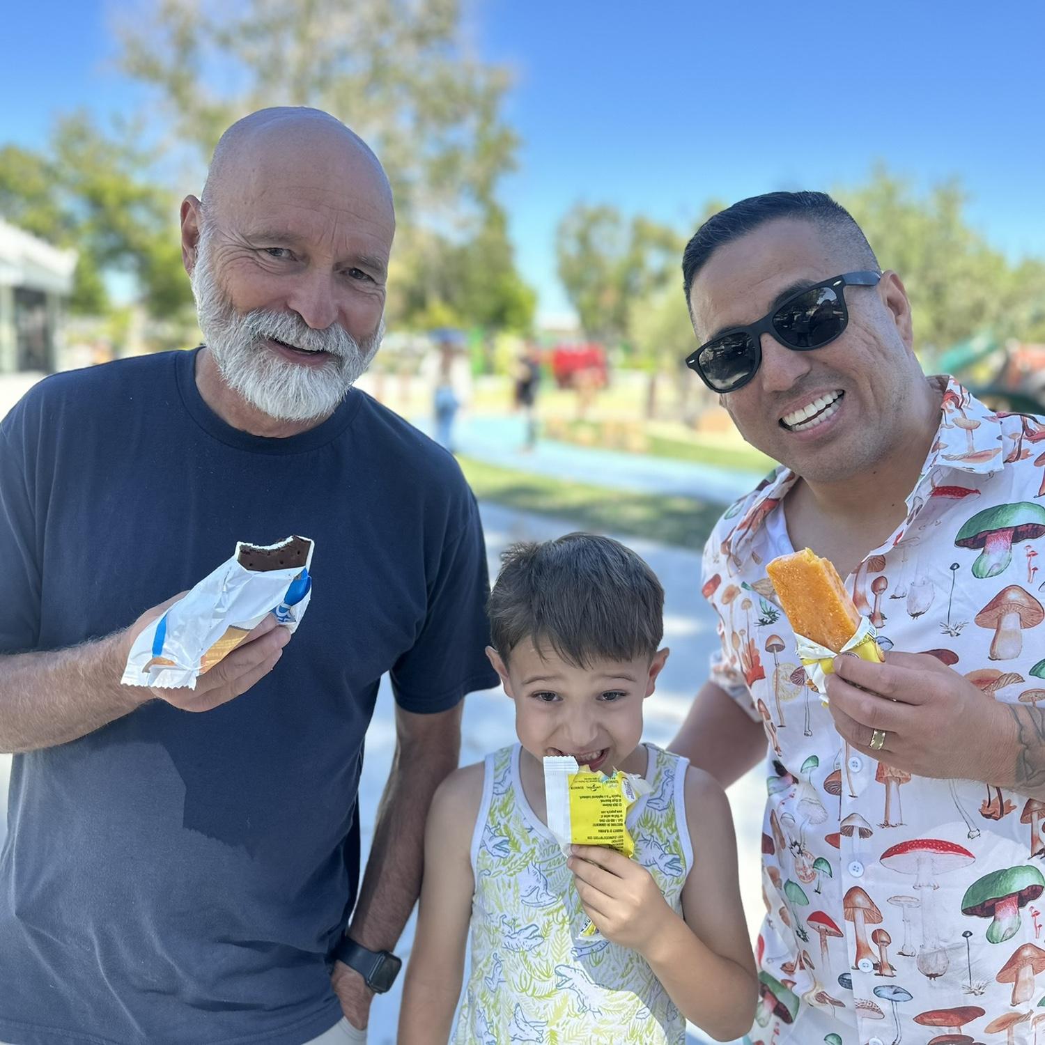 Papa, Jordan, and Daddy after our bike ride enjoying some well deserved ice cream