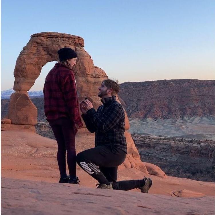 Zach proposed at Delicate Arch at sunset in Arches National Park