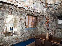 Visit No Name Pub and hang a personalized dollar on the ceiling or wall 🍺💵