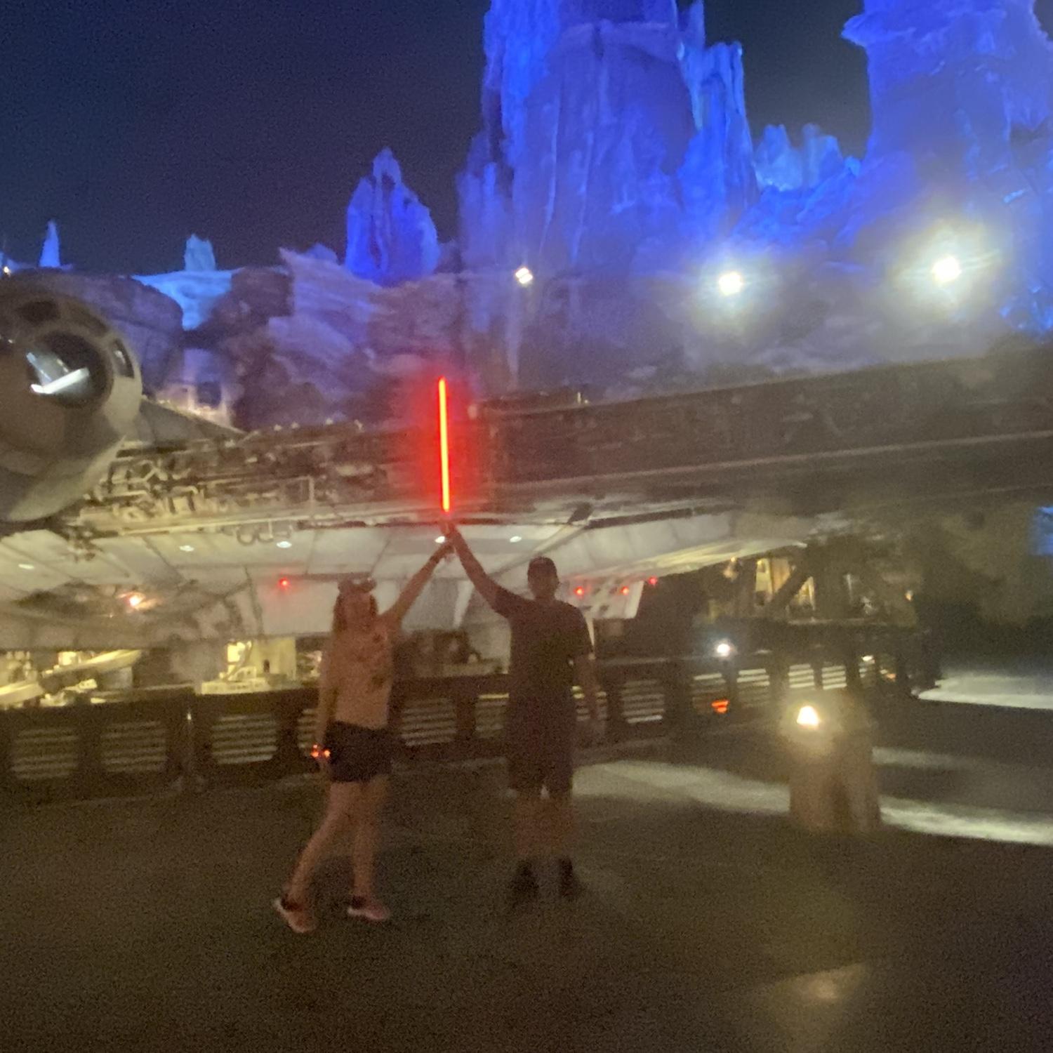 Landon made a light saber and Morgan took this picture in front of the Millennium Falcon