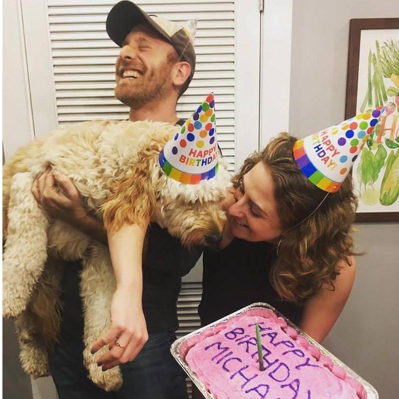 One happy family...and one very spoiled puppy