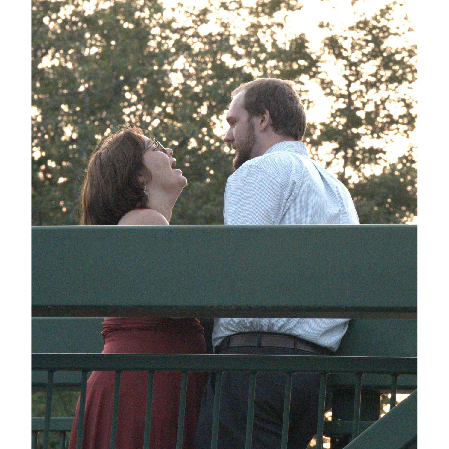 Christina walked back over from looking at the view down the bridge and was talking to Salem. This was right before they got engaged.