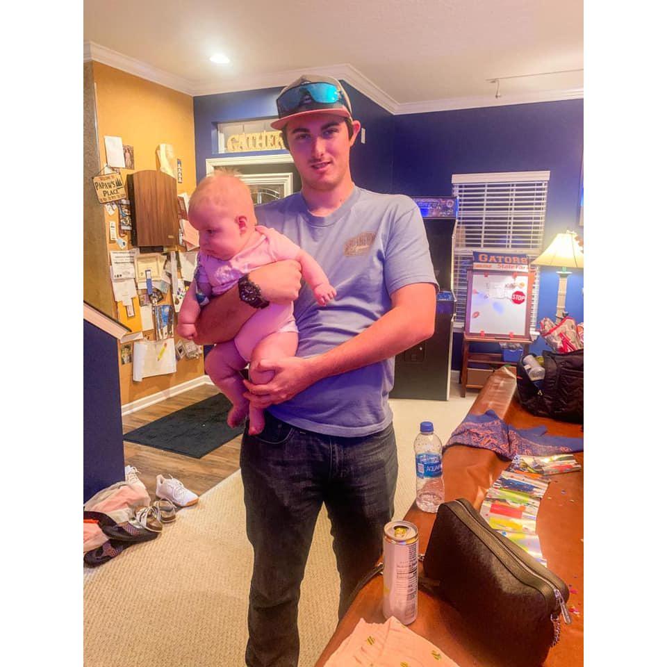 One of Ryan's first time holding a baby, featuring baby Paisley!