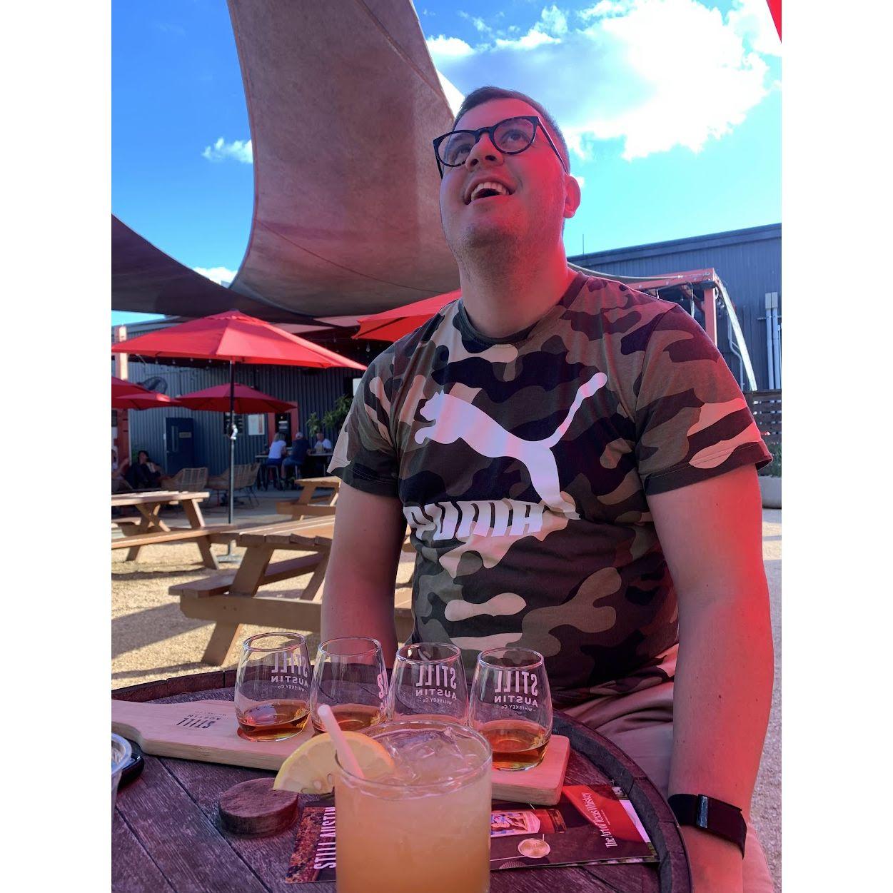 This photo is from one of Amanda and Eric’s favorite U.S. cities—Austin! While they were there, Eric landed a new job, so they celebrated with a trip to a local distillery.