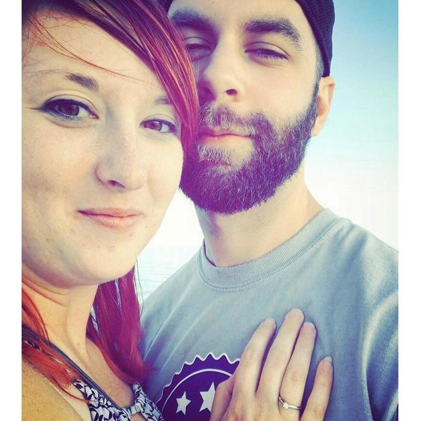 A few moments after he proposed out at the light house in Port Washington