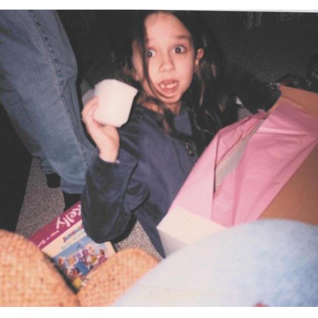 Alexis receiving a very exciting Christmas gift (2002)