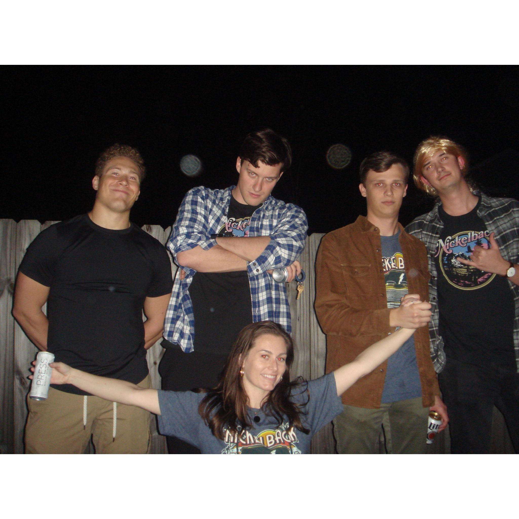 Allison and Kyle with Allison's law school squad, who really loves wearing Nickelback attire!