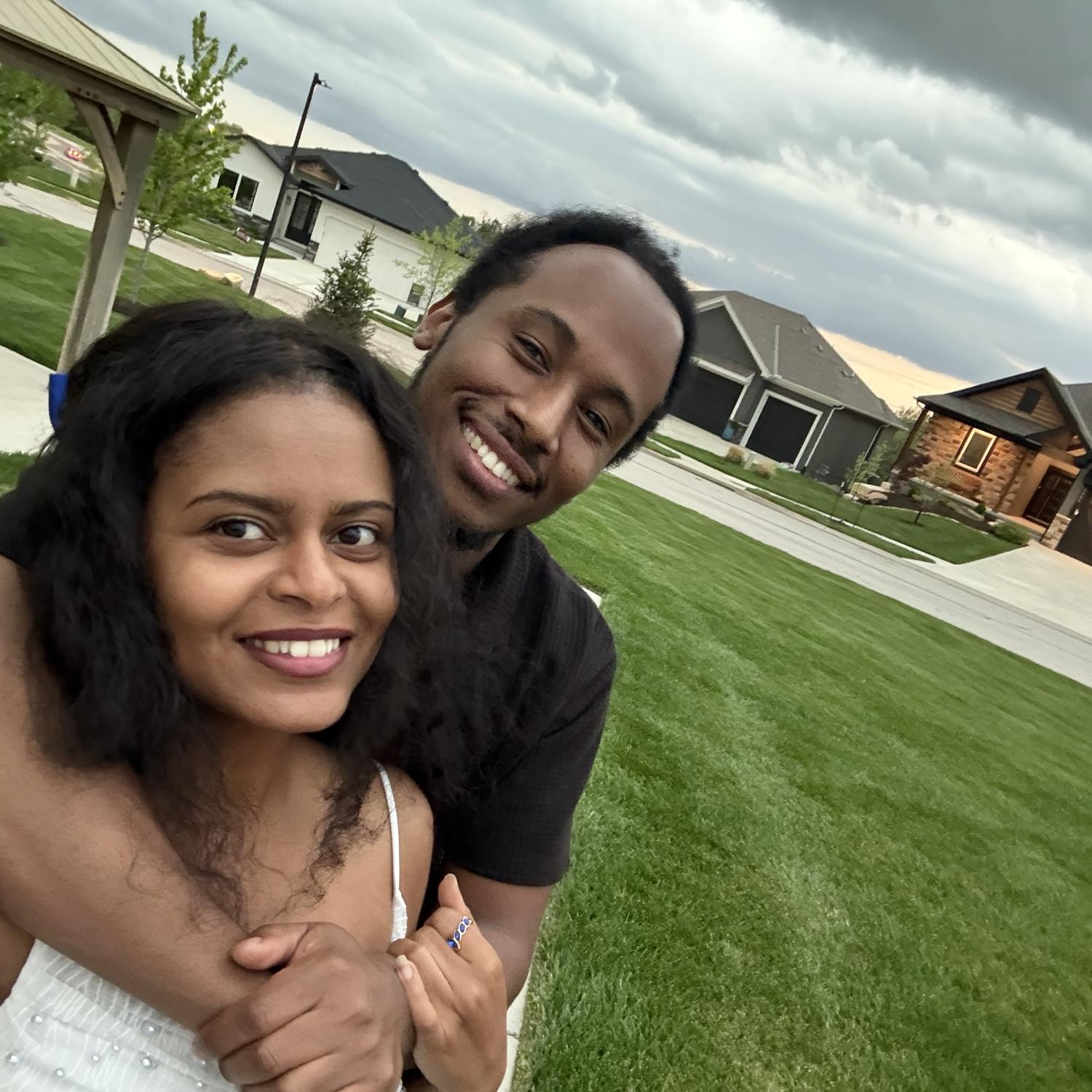 Taking picture with our dream house!