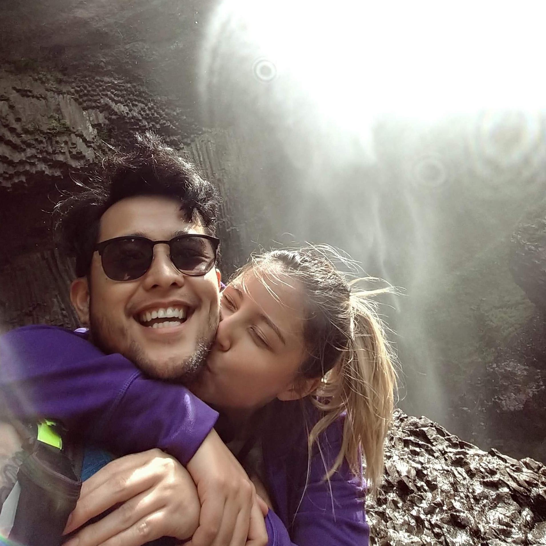 Taking 'us-ies' under a waterfall