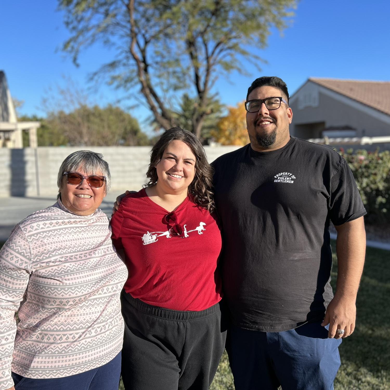 Monette, Emily and Ethan at a family friend's Christmas party