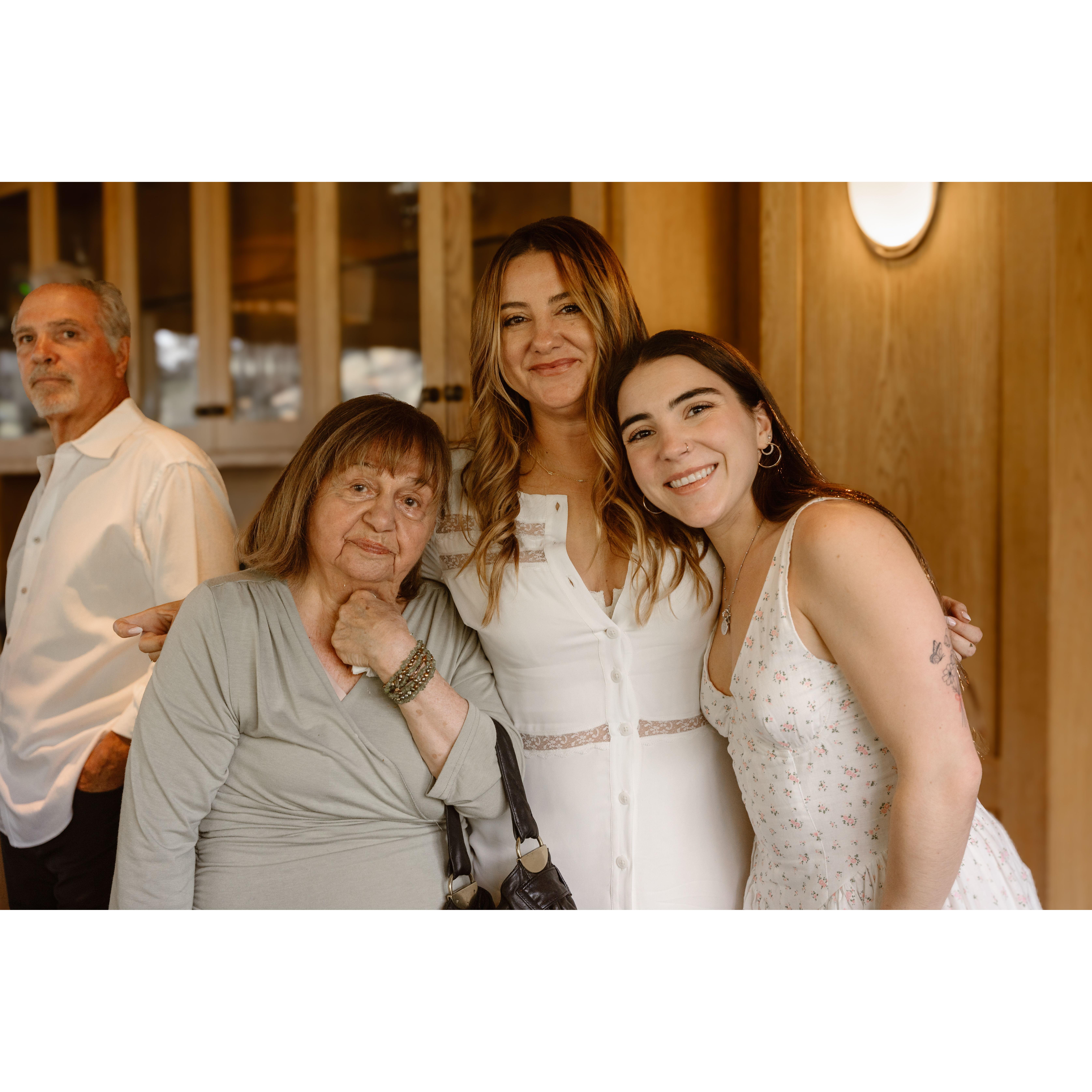 Cailan with grandmother and sister, Angelina (father, Rich, creeping in background)