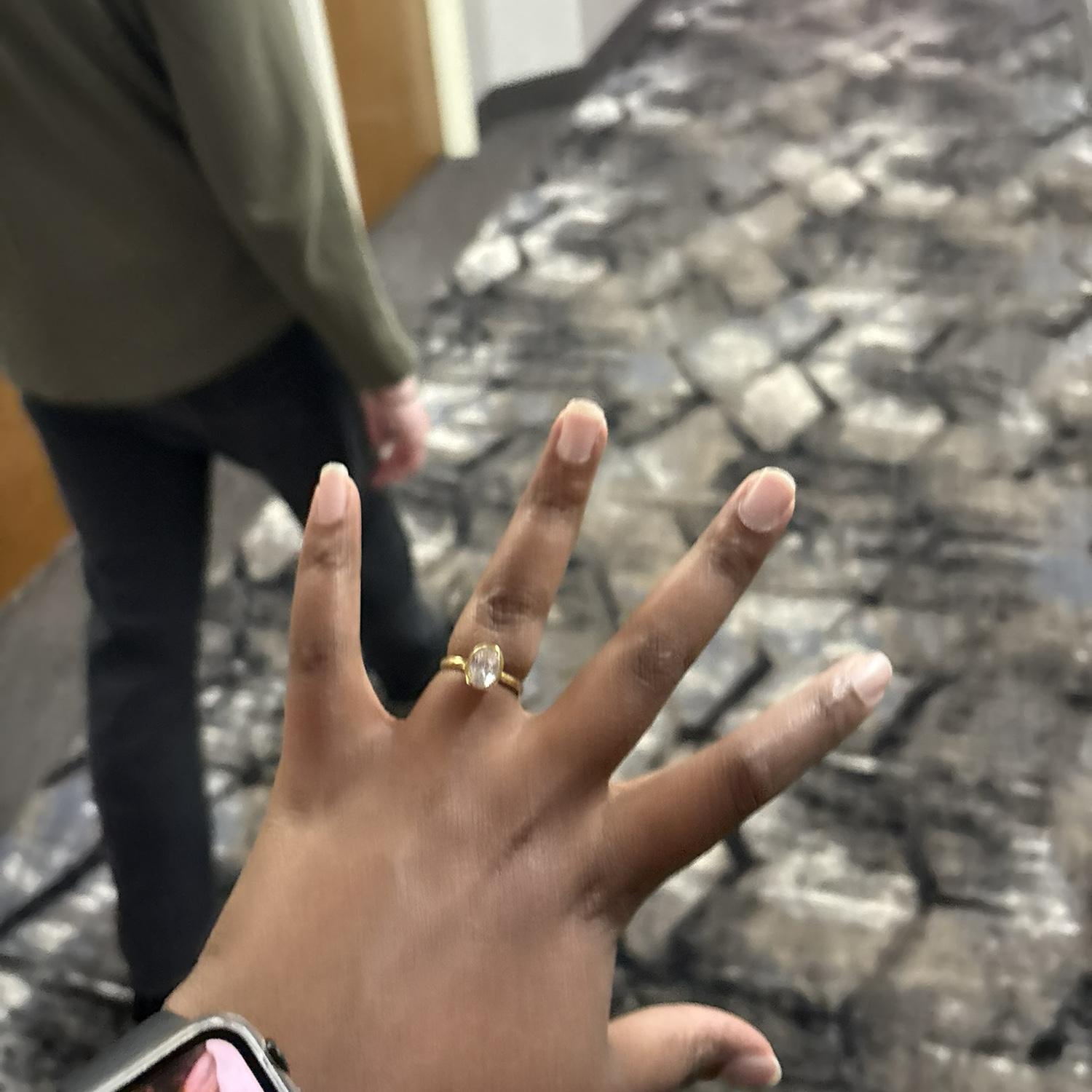 The day we got engaged at an anime convention right after we realized our hotel was gross but it ended up being fine and we went to a Photo Booth to celebrate