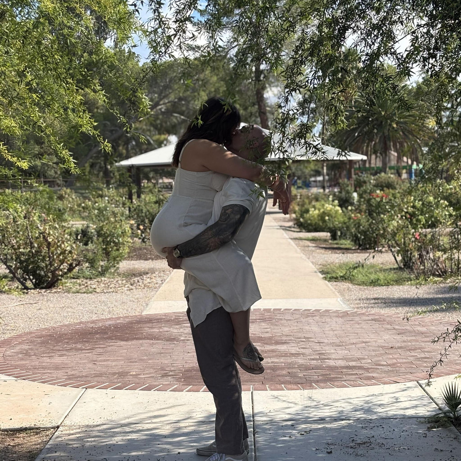 Romance in the Rose Test Garden at Reid Park. Fun Fact: Reid Park is where we got engaged!