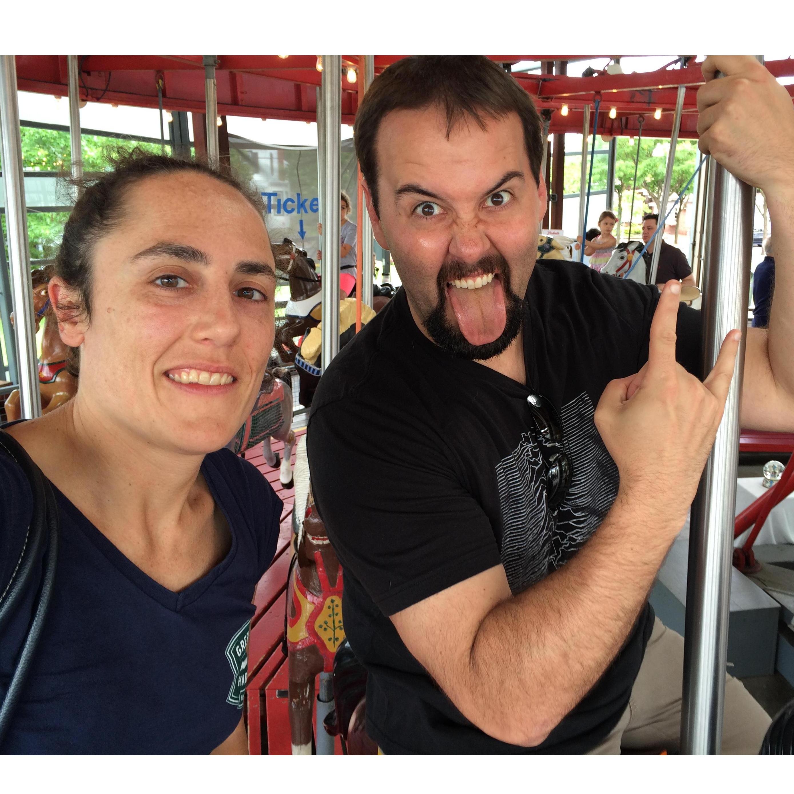 Watch out for your children, crazies on the merry go round! Greenport, NY, 2016.