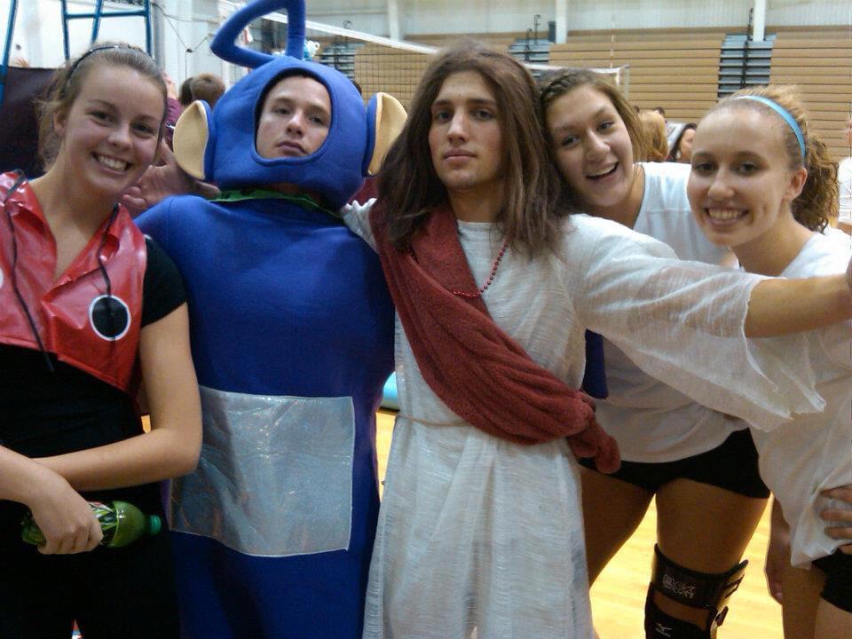 Zac proudly lead the fan section for all of my volleyball games