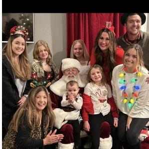 Family Christmas photo at the Johnsons annual party