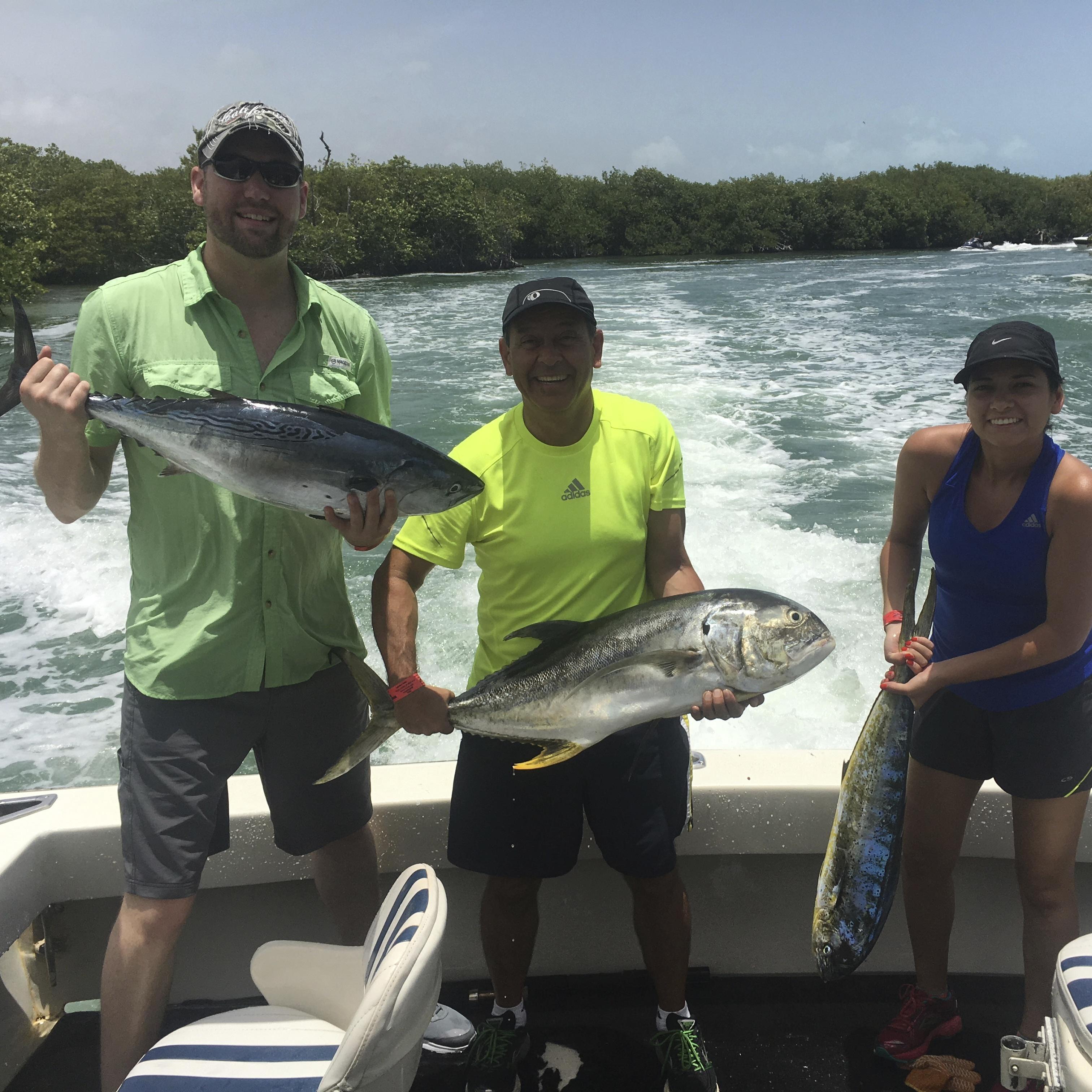 Successful fishing expedition off the coast of Cancun. Austen was a happy camper!