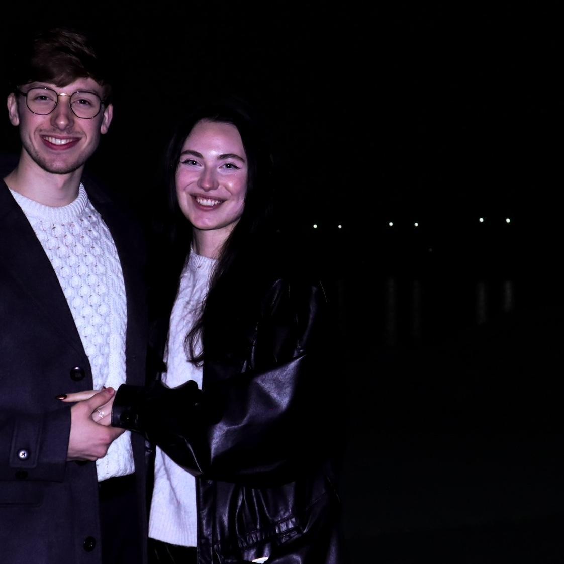 The moment after Holly said "Yes!" to Sam on shore of the Susquehanna River in Sam's hometown, captured by Sam's brother, Scott.