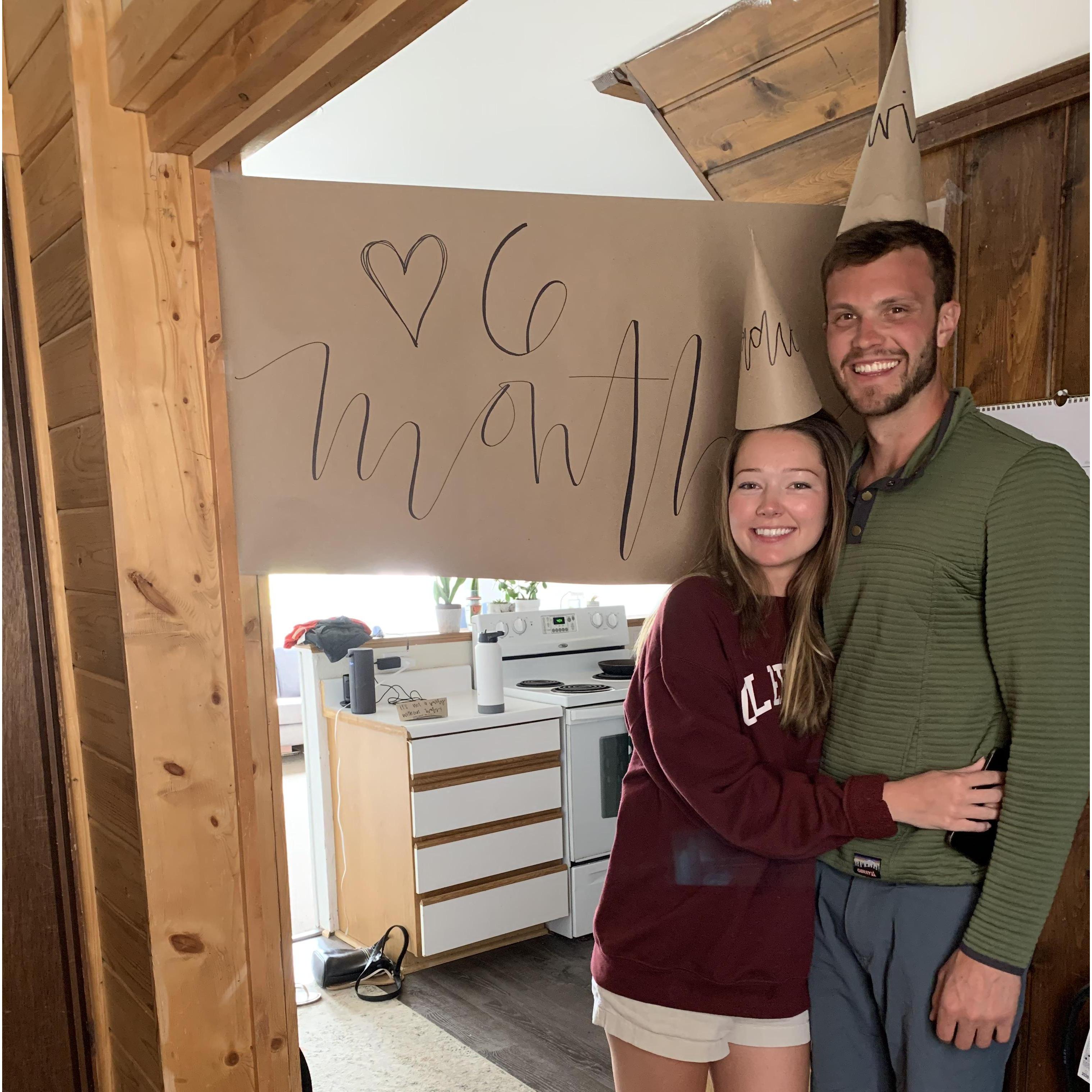 Sunburnt after paddleboarding but still so excited to celebrate six months together! We came back from the pond & Niah (Sadie's now Bridesmaid) hung this in Sadie's apartment with hats to match! Ha!😂