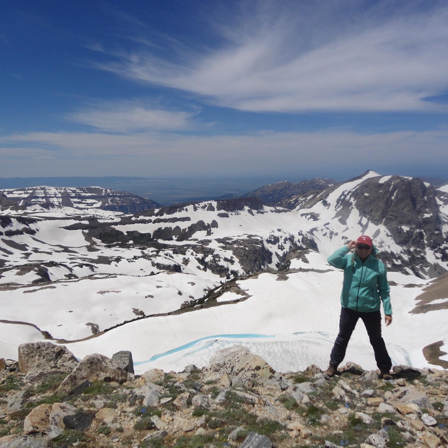 Sitting on the saddle below the Middle Teton, July 2017.