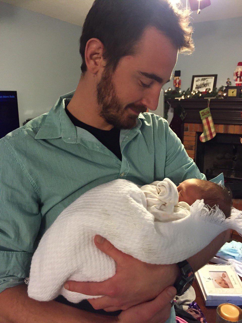 St Louis 2015 - Jordan holding his new niece, Hannah (our youngest flower girl).