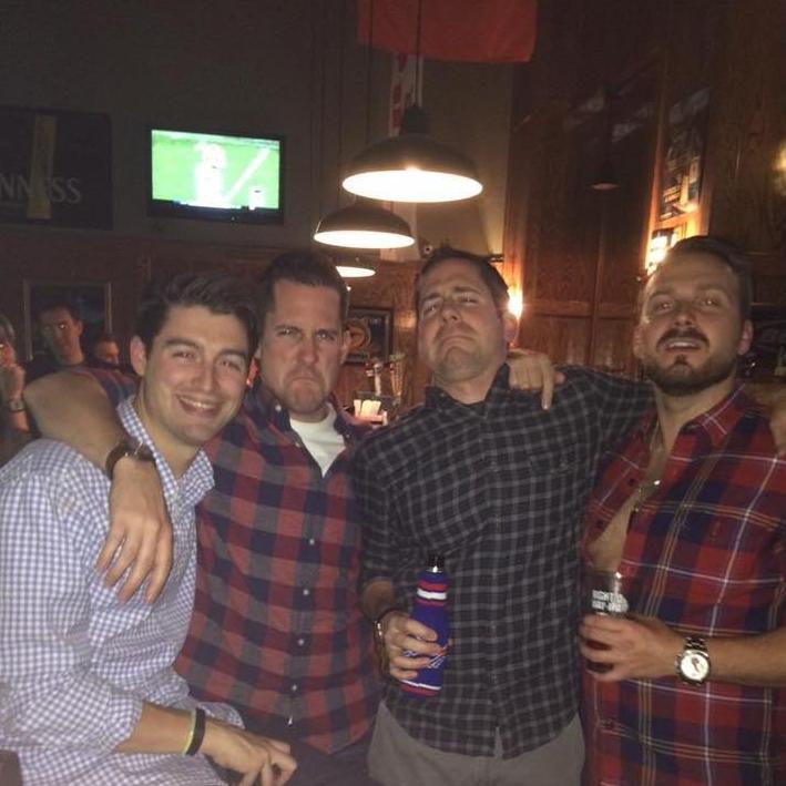 Groomsmen in plaid.