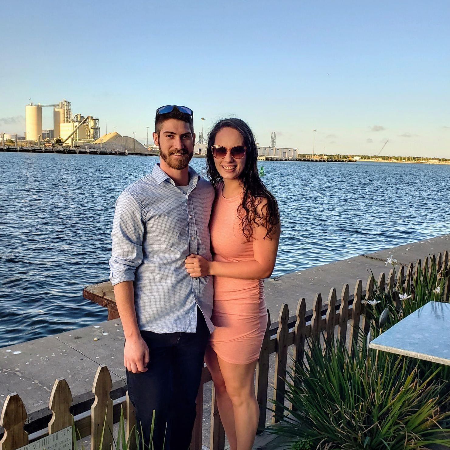 "Our very first photo together" on our first vacation together down in Florida. Fun Fact the first night is when we officially became a couple.