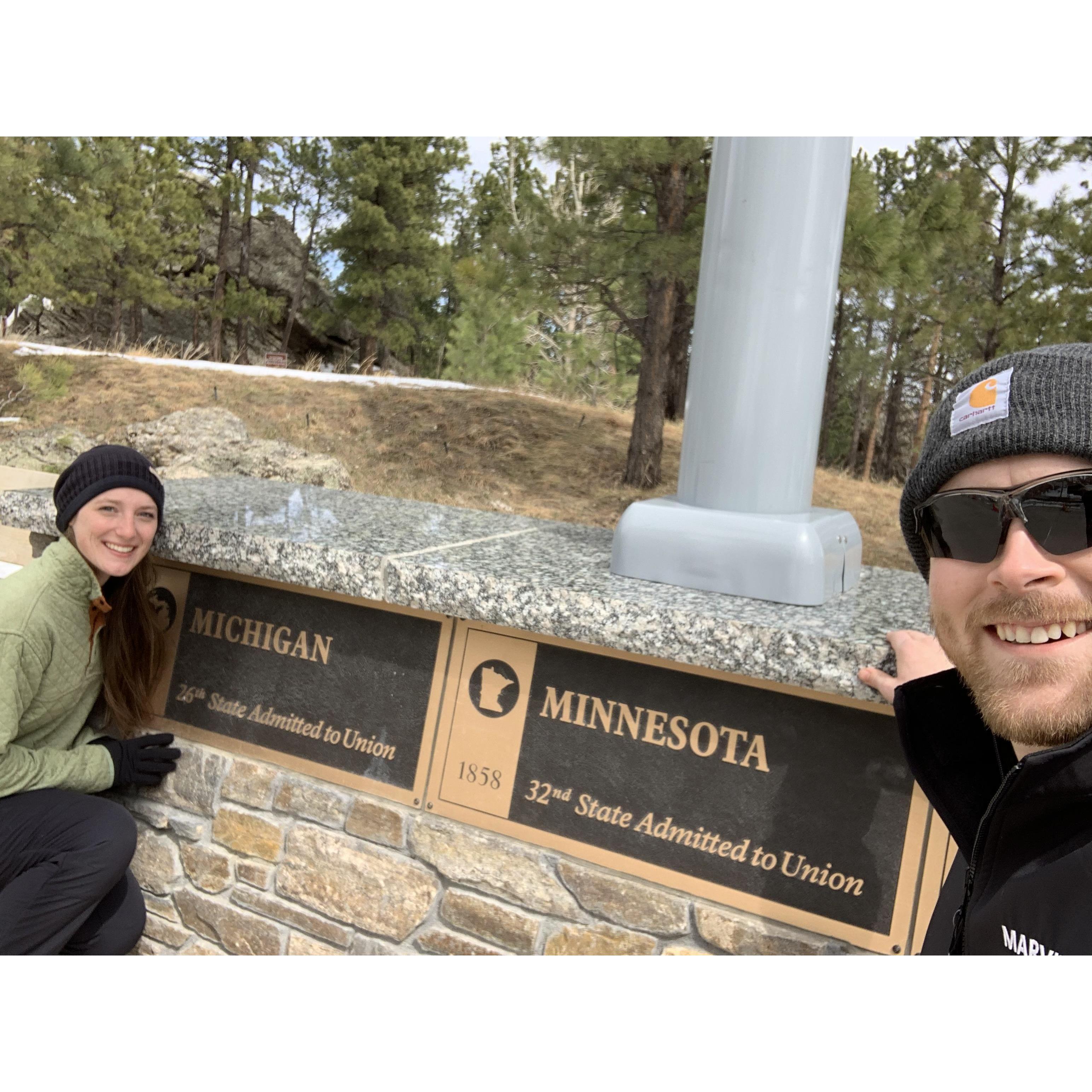 Visiting Mount Rushmore. Our home states were right next to each other!