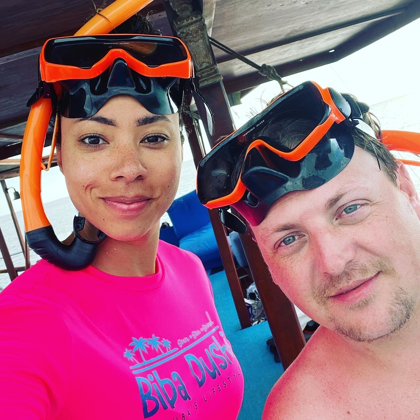 Shea's first time snorkeling when Mike almost had to jump in and save her from the fish