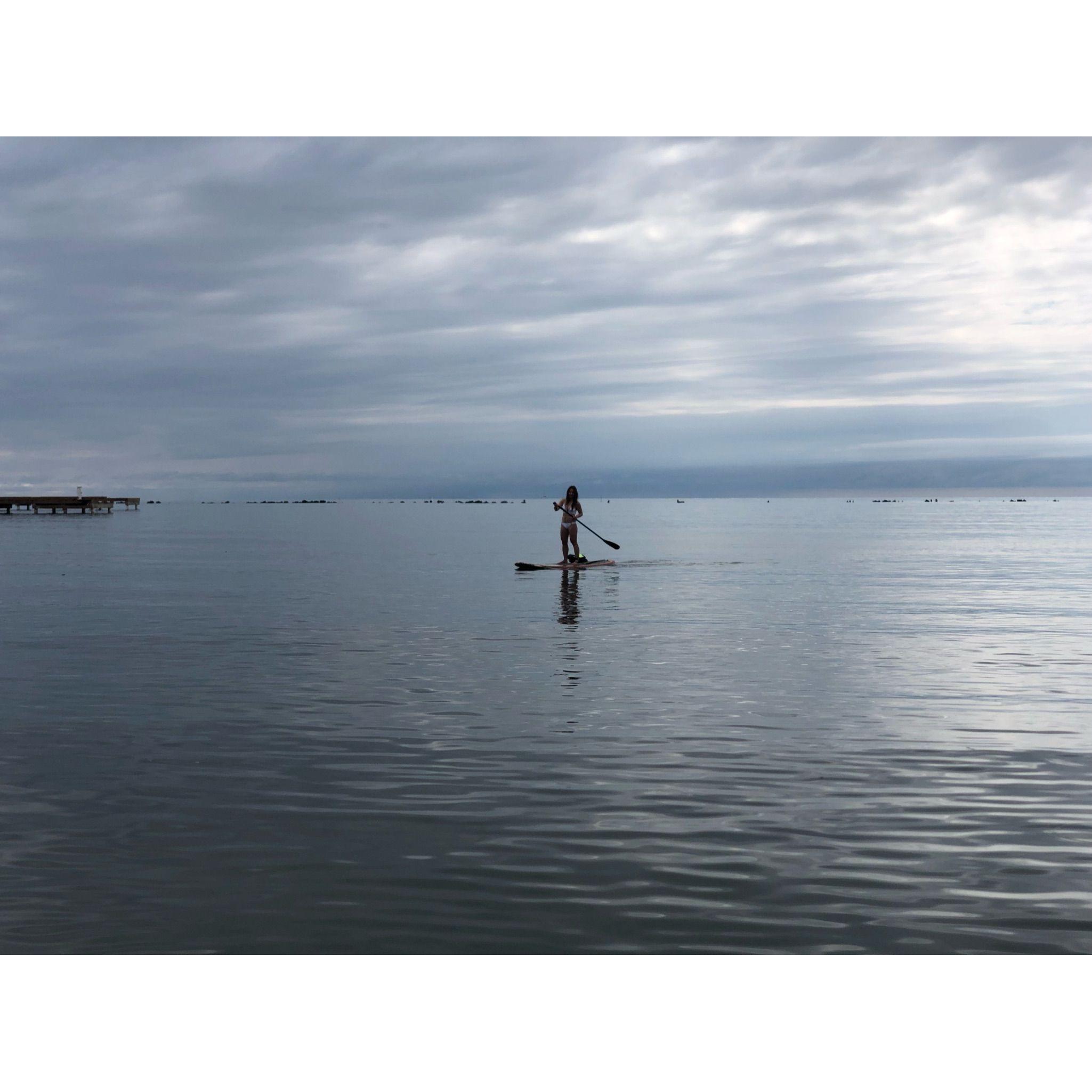 6am paddleboarding on the smooth ocean water.  We were the only ones on the ocean that morning.