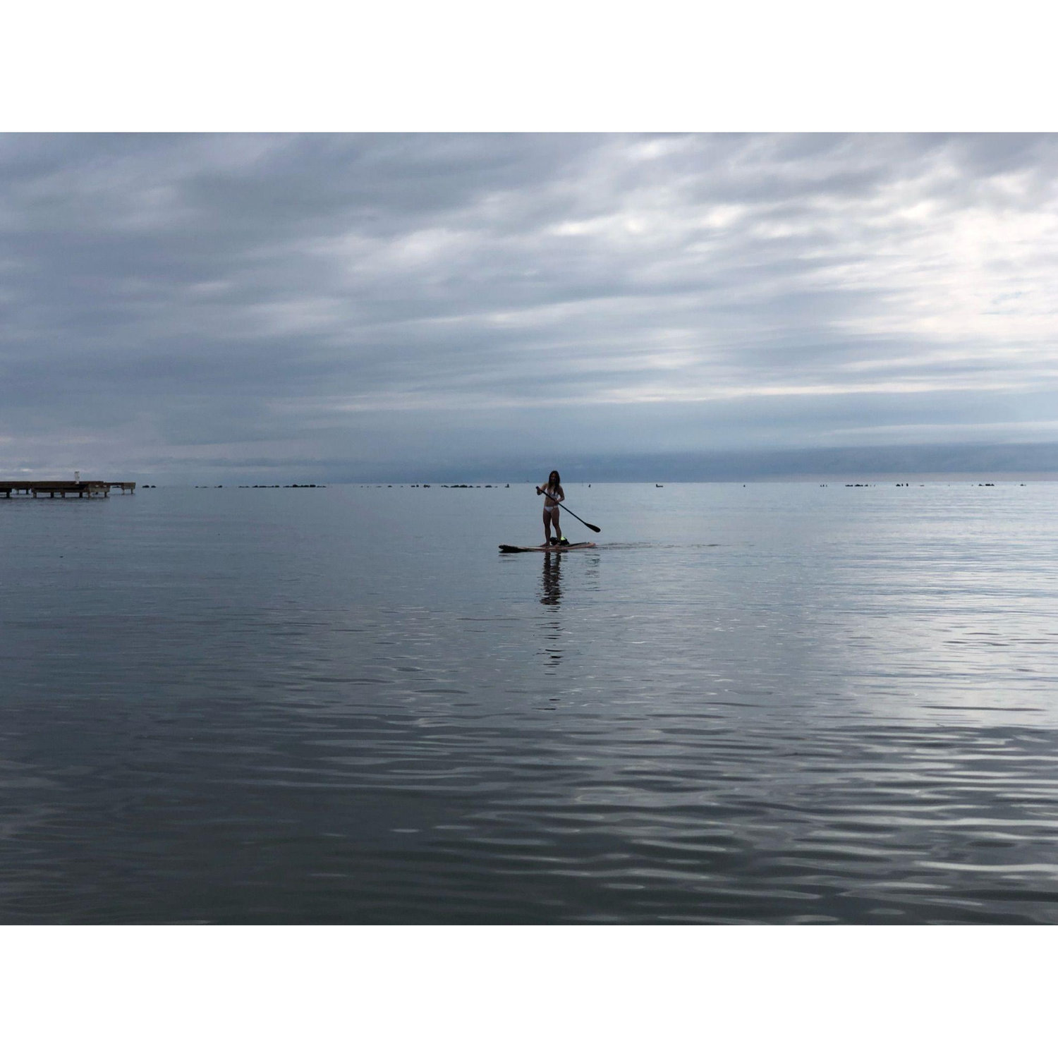 6am paddleboarding on the smooth ocean water.  We were the only ones on the ocean that morning.