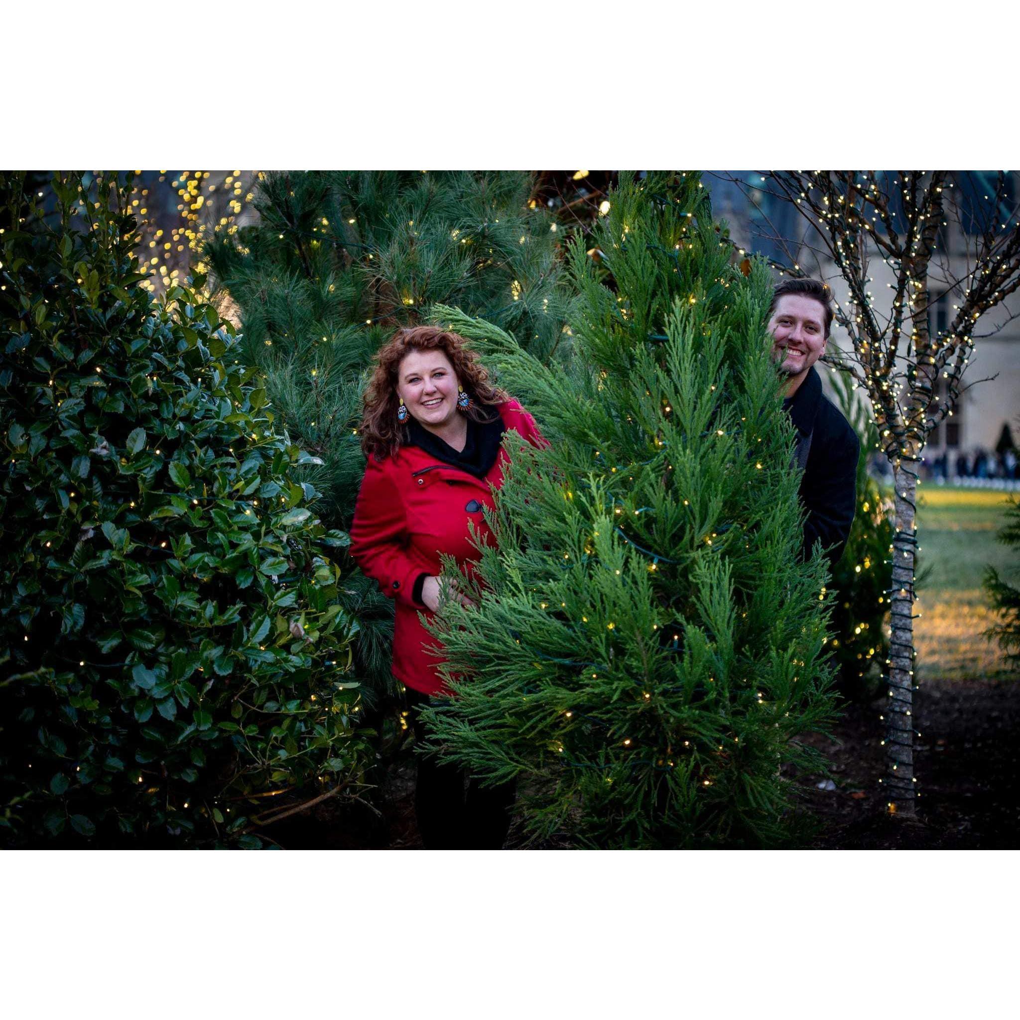 One of our favorite engagement photos! The photographer said "oh! Go stand by that tree!" and we both proceeded to pick a side and pop out from either side of the tree. Very on brand for us!